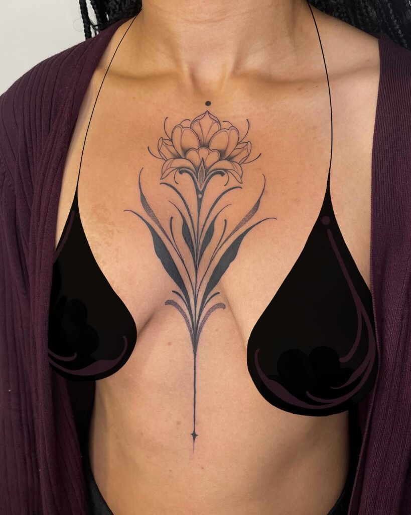 Lotus-inspired floral sternum tattoo with spiritual symbolism
