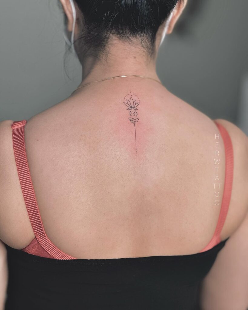 Lotus Spine Tattoo Elegant Symmetrical and Symbolic of Enlightenment