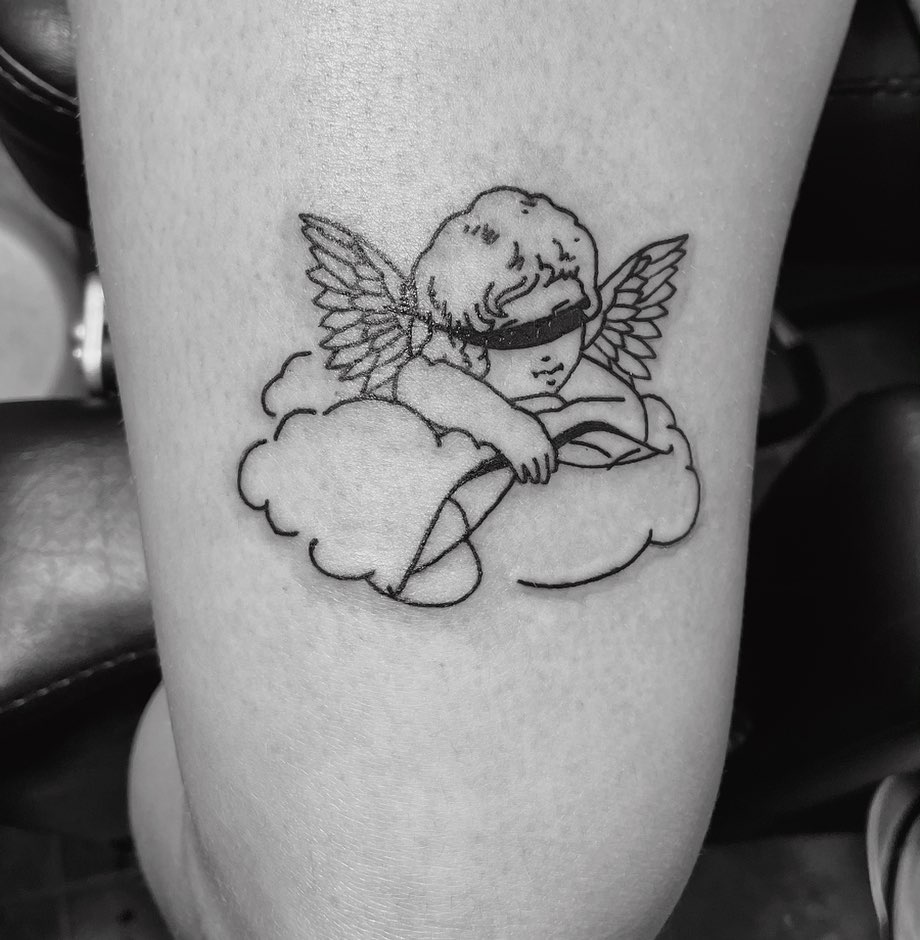 Love Beyond Sight Cupid 'Love is Blind' Above Knee Tattoo Ideas