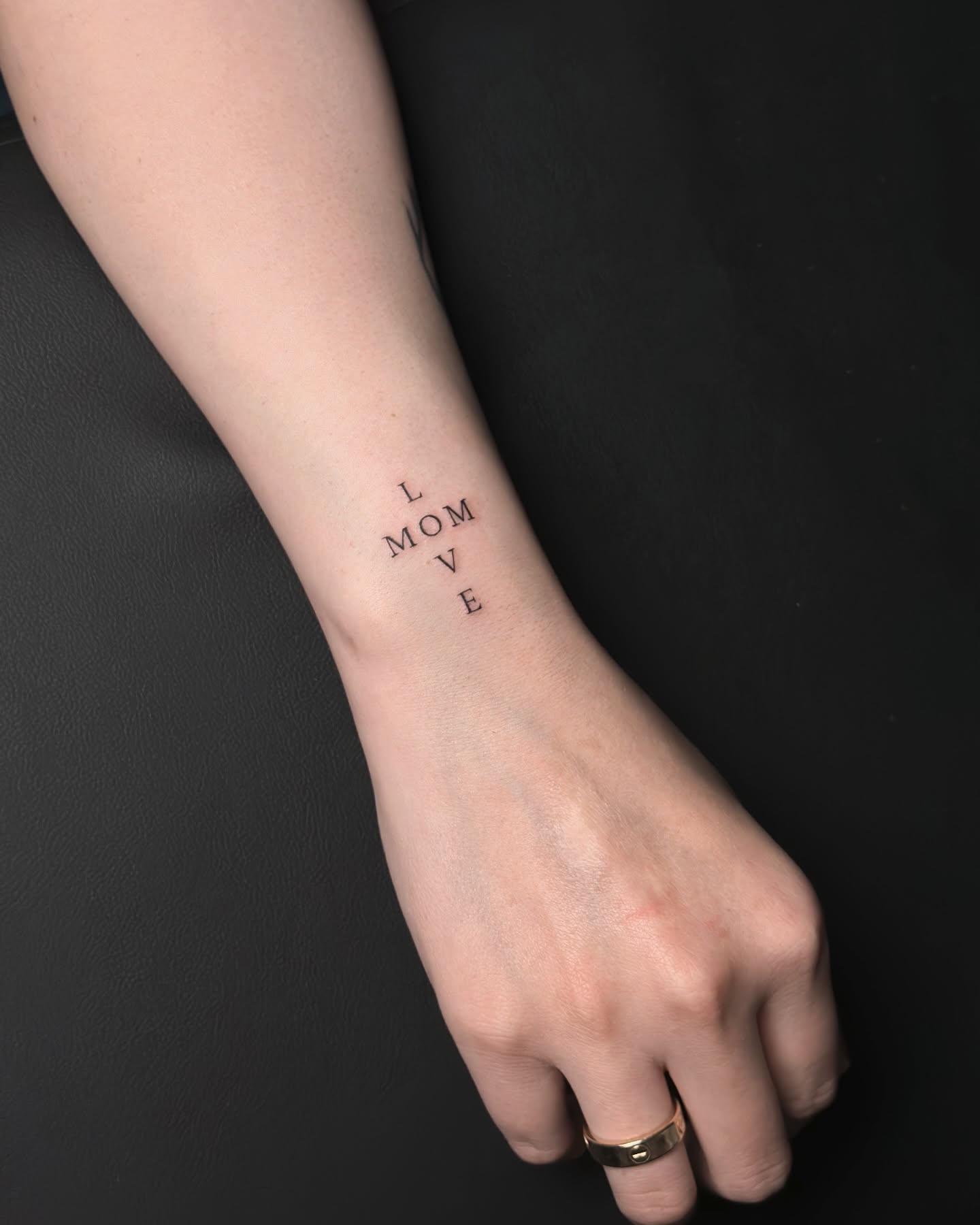 Love and Mom Wordplay Tattoo Creative and Sentimental Family Tribute