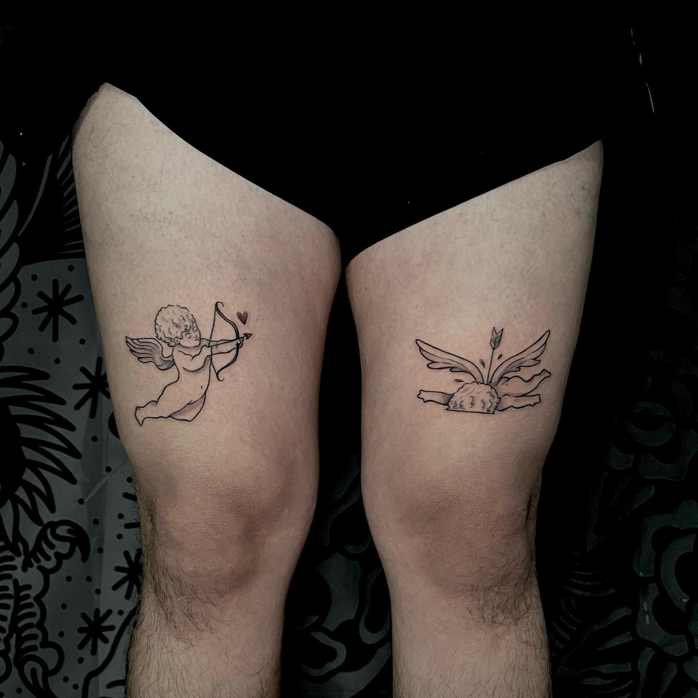 Love Cupid Design For Tattoo Above Knee