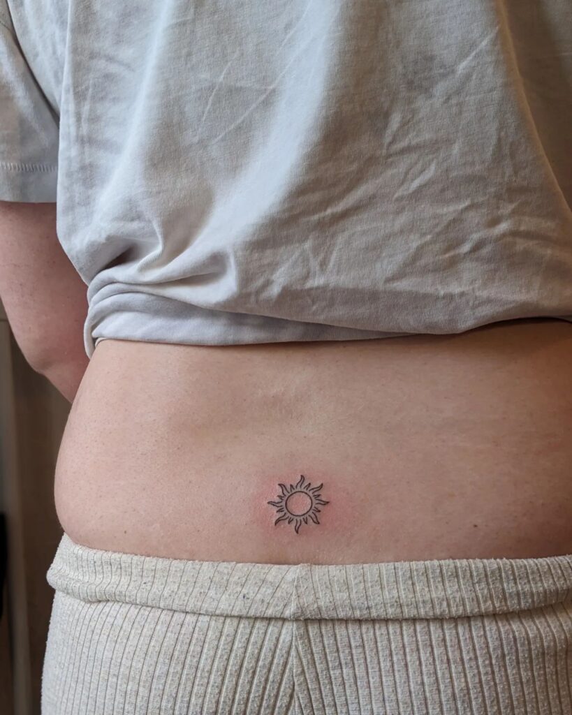 Lower Back Sun Tattoo For Female: Radiant Symbolism
