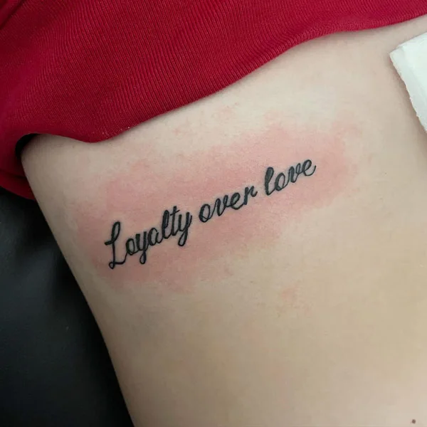 Loyalty over love tattoo 1