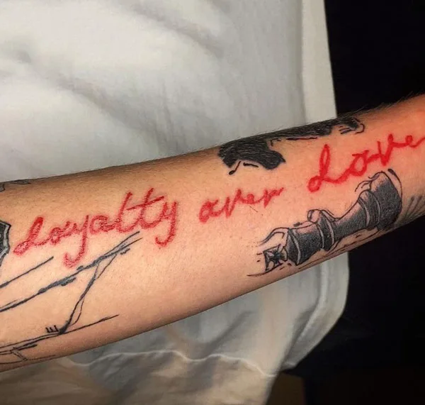 Loyalty over love tattoo 4
