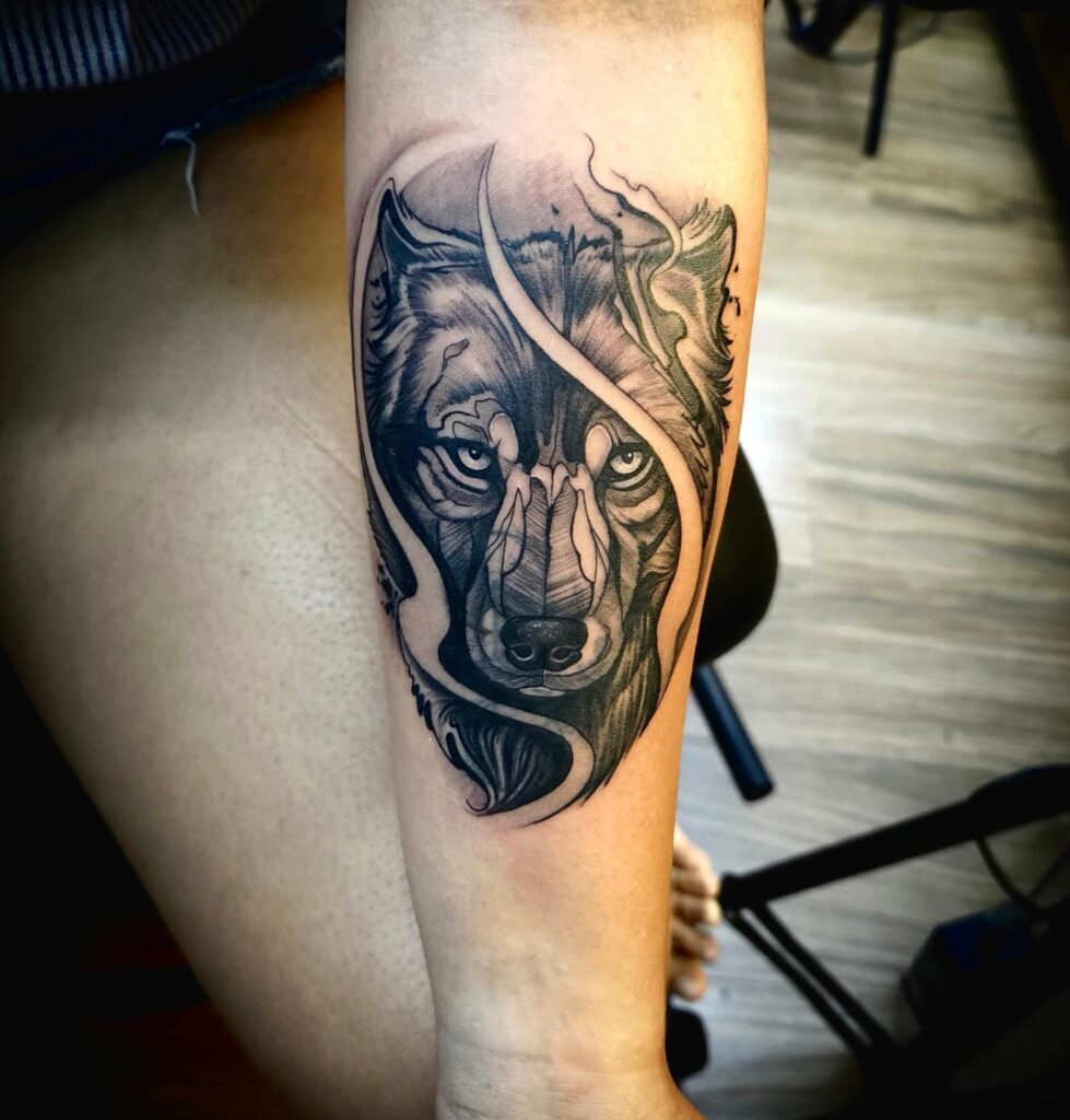 Loyalty symbolized alpha wolf forearm tattoo design