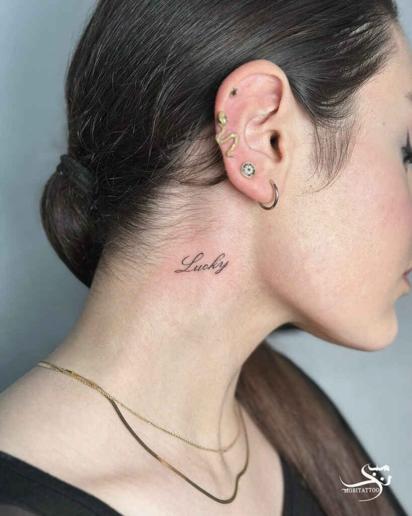 Lucky Cursive Neck Tattoo Delicate Symbol of Fortune and Gratitude