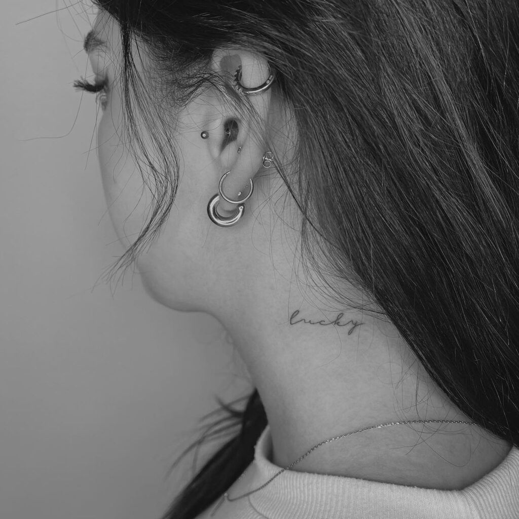'Lucky' Script on the Side of the Neck: Lucky Vibes