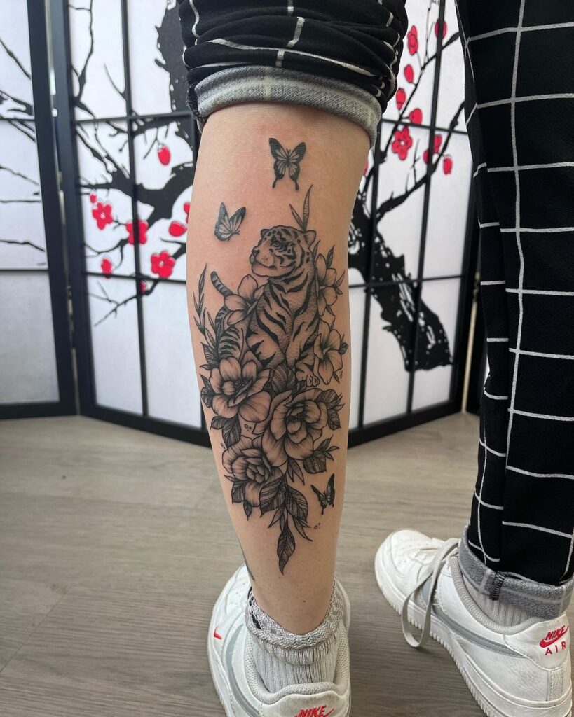 Majestic tiger with flowers and butterflies calf tattoo splendor 