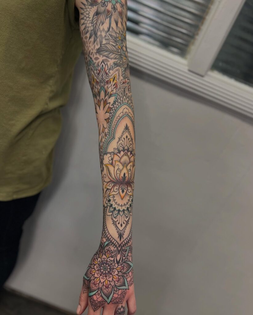 Mandala and ornamental tattoo sleeve with lotus and dotwork