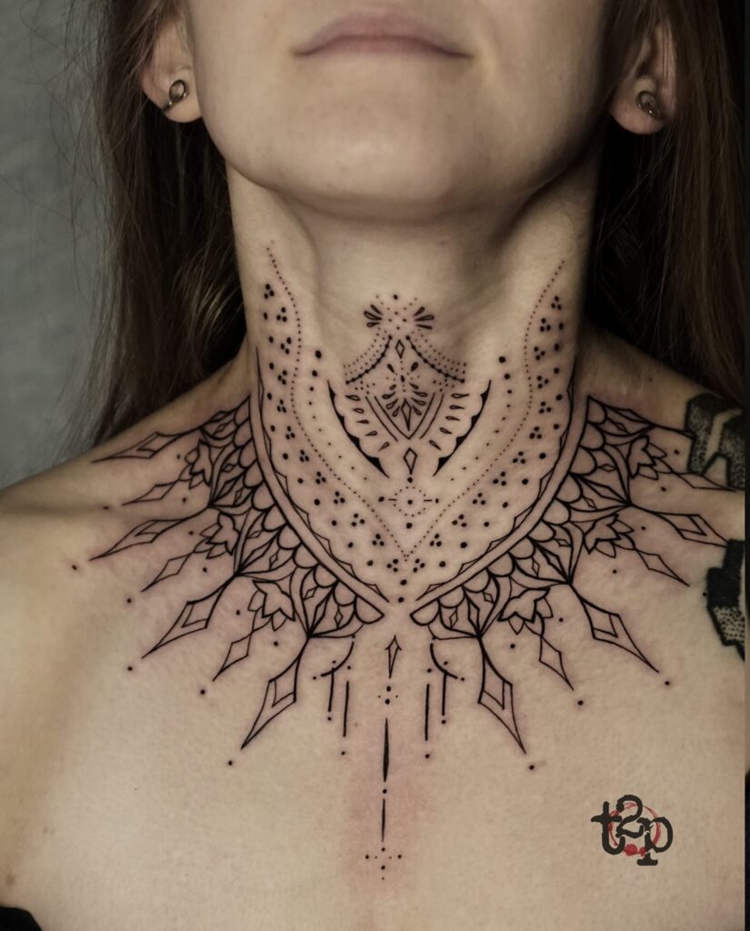 Mandala-Inspired Neck and Chest Tattoo Symmetrical and Ornamental