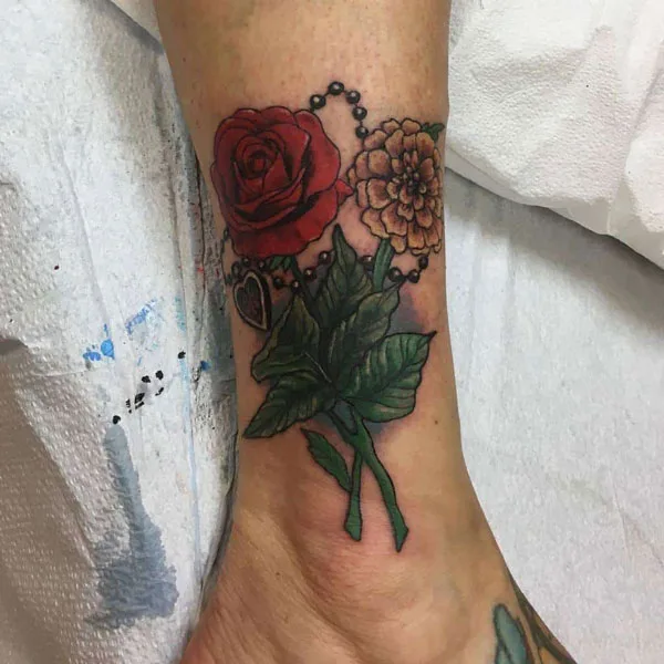 Marigold and rose tattoo 1