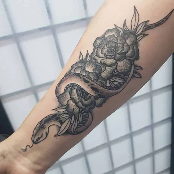 Marigold and snake tattoo 1