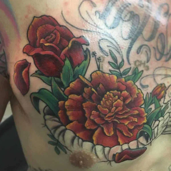 Marigold tattoo on chest