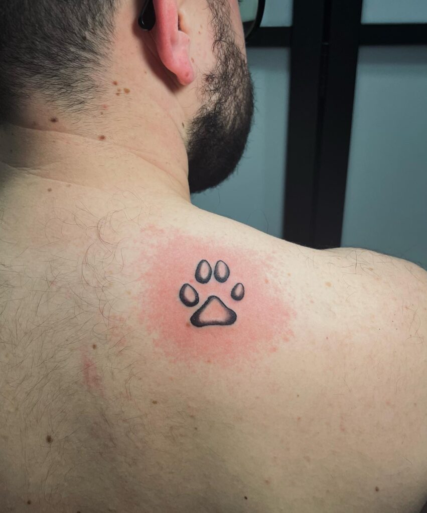 Masculine Dog Paw Print Tattoo on the Back of the Shoulder: Shoulder Paw Artistry