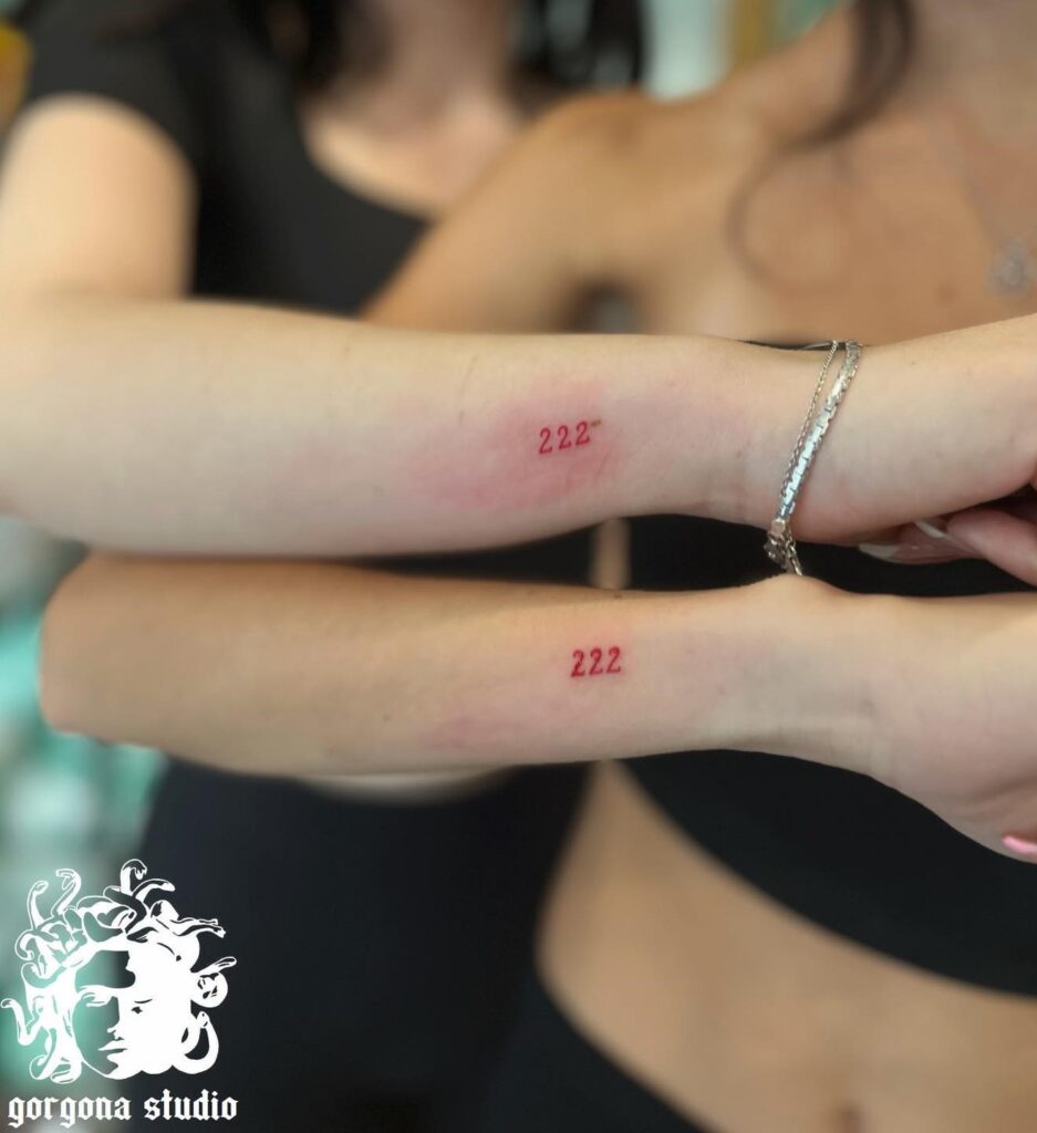 Matching '222' Tattoos for Friends on the Side of the Wrist, a Vibrant Connection: Red Duo 