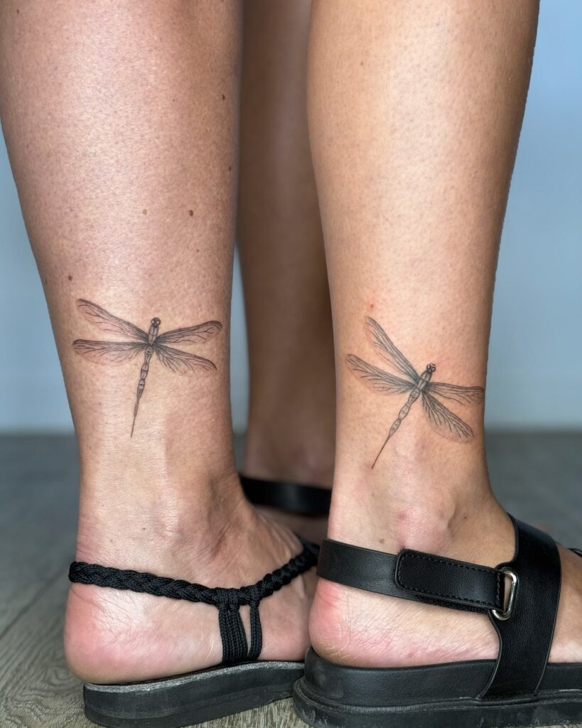 Matching Delicate Dragonfly Ankle Tattoos Representing Shared Growth