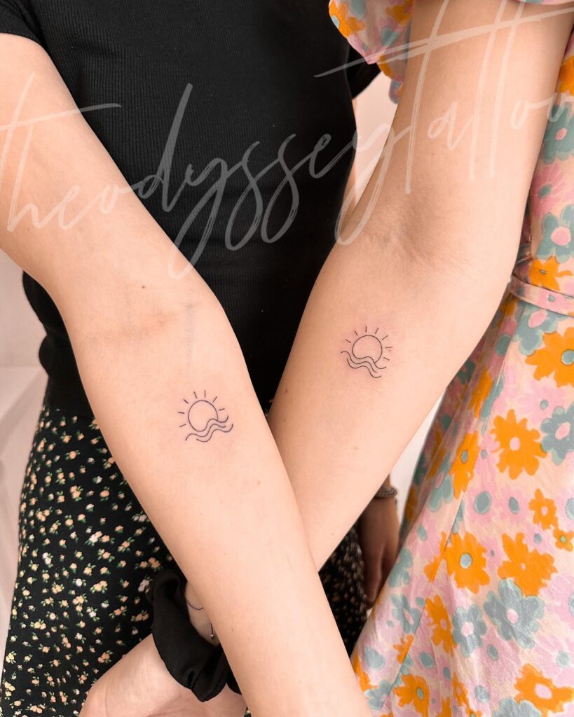 Matching sister tattoos forearm wave and sun art
