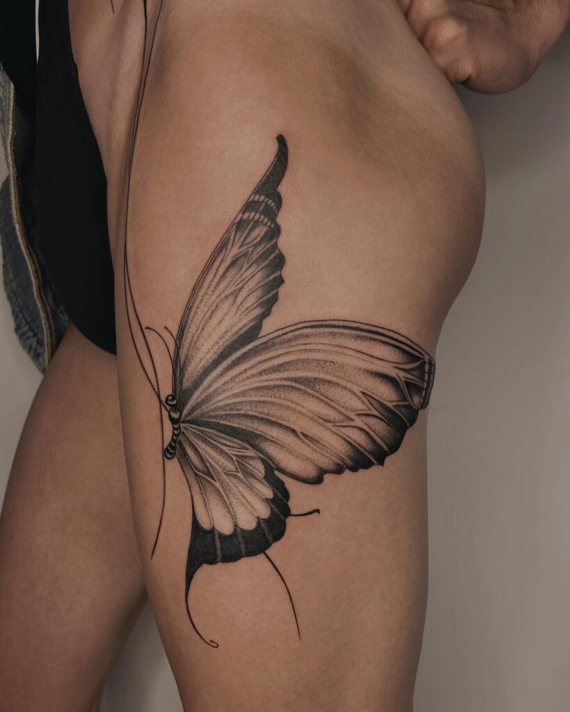 Meaningful butterfly thigh tattoos personal expression