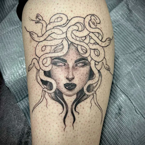 Medusa face tattoo