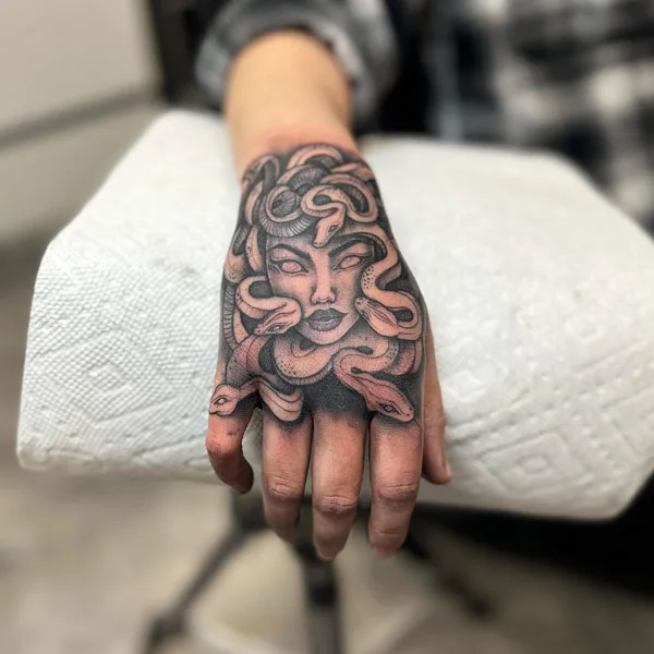 Medusa hand tattoo