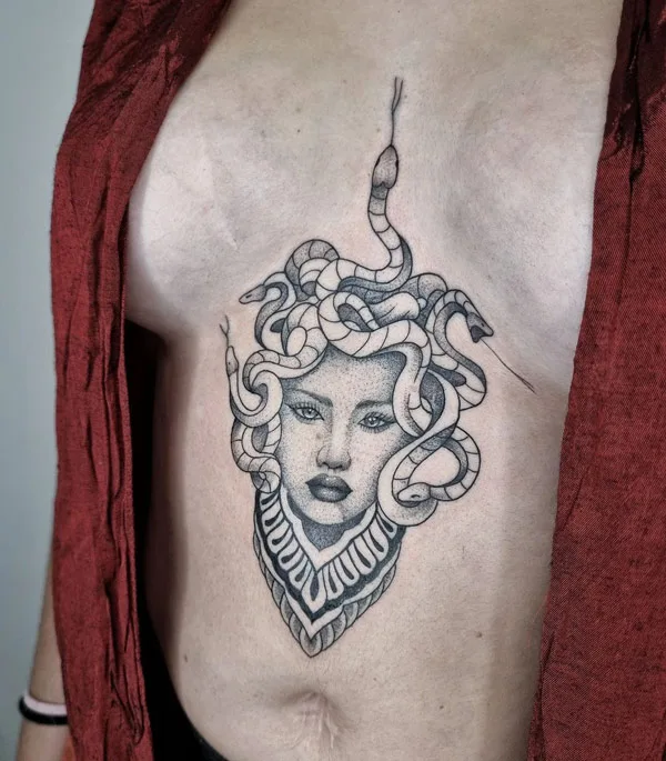 Medusa sternum tattoo
