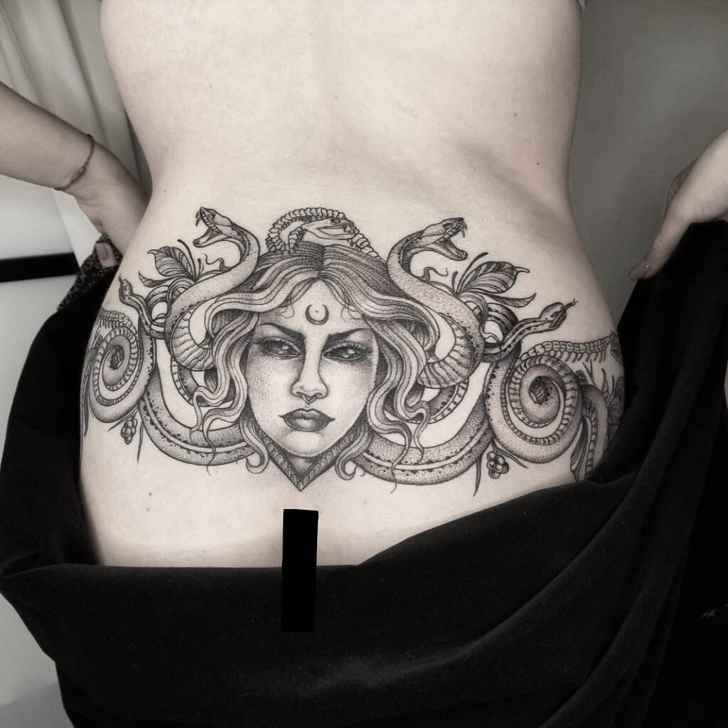 Medusa with Snakes Tattoo, a Glimpse of Ancient Greek Art on the Lower Back: Mythical Allure