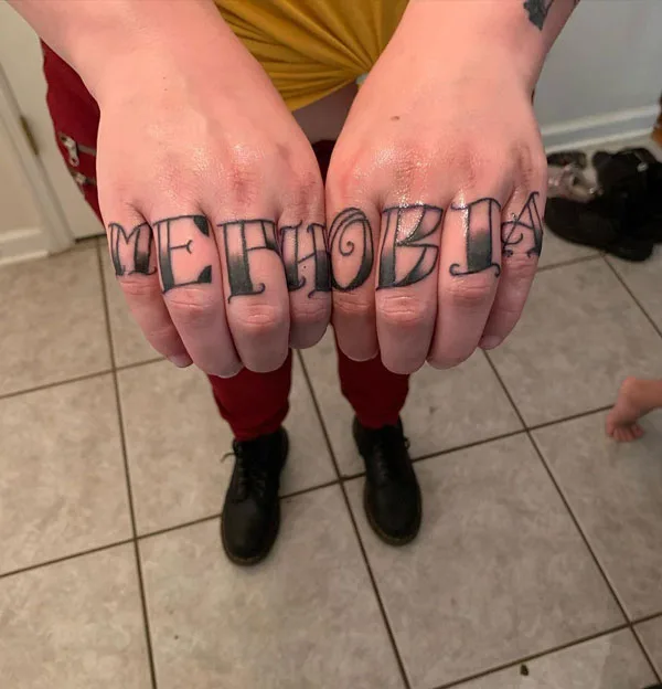 Mephobia Finger Tattoo
