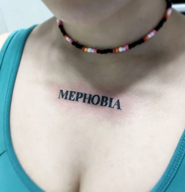 Mephobia chest tattoo