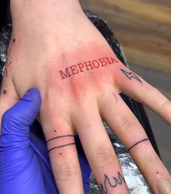 Mephobia hand tattoo