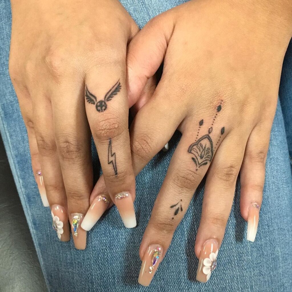 Micro Golden Snitch Finger Tattoos