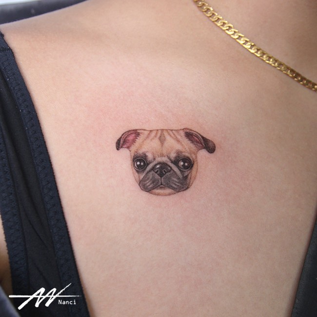 Micro-Realistic Pug Portrait Tattoo on the Collarbone: Pug Perfection
