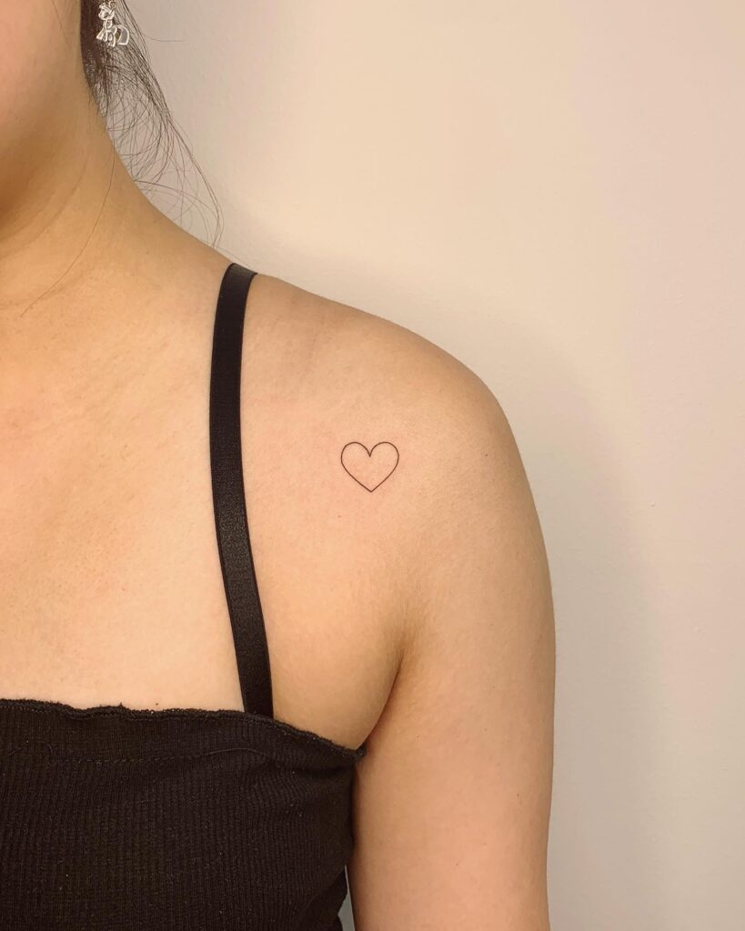 Mini thin line outline love heart on shoulder