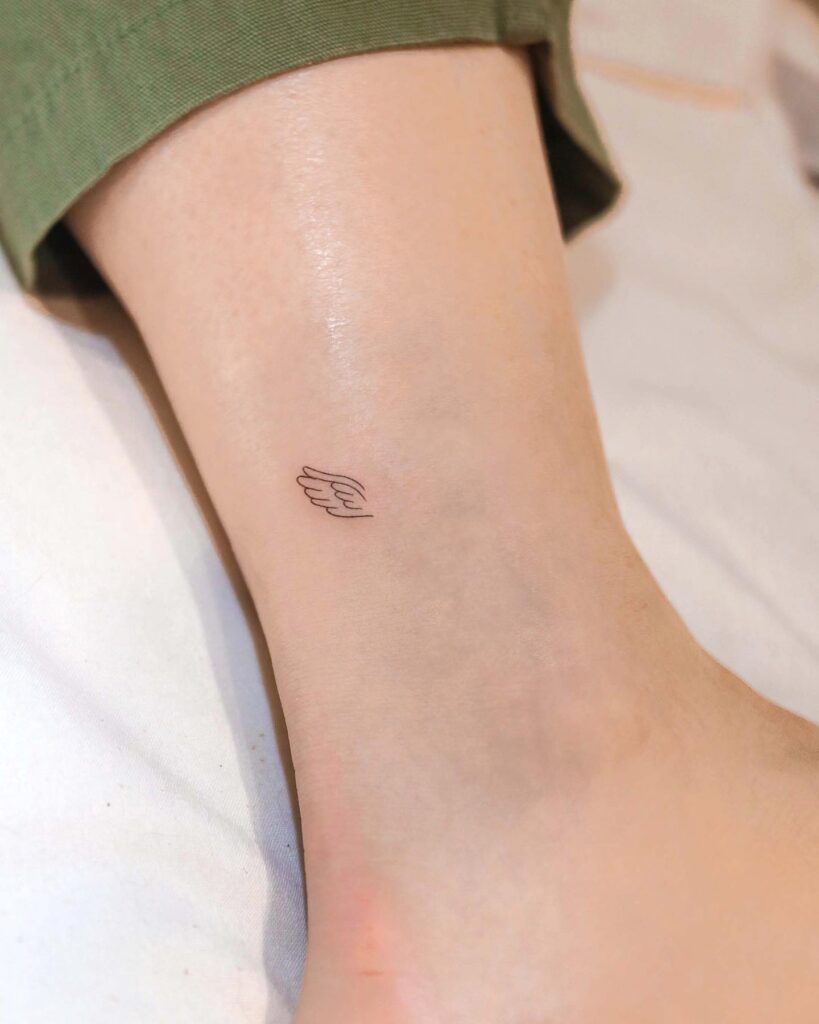 Mini Wing Tattoo Side View Above the Ankle for a Subtle Touch of Flight: Mini Soar