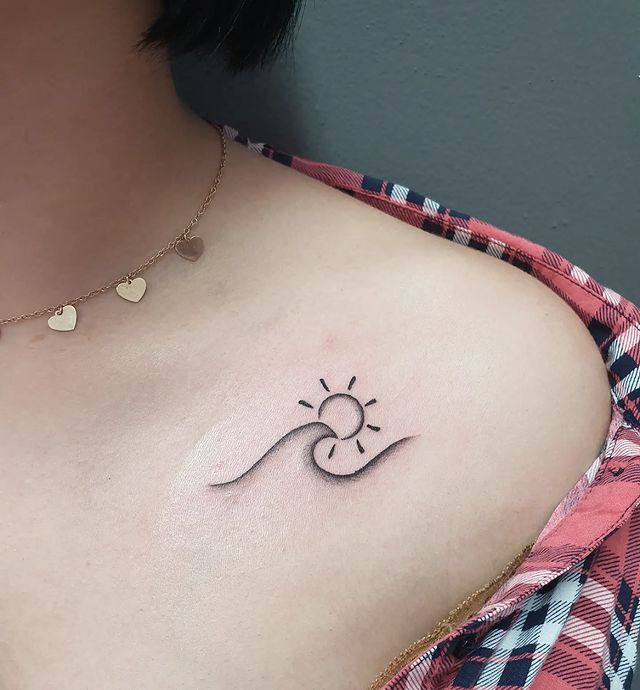 Minimal Sun and Wave Tattoo Design on the Shoulder