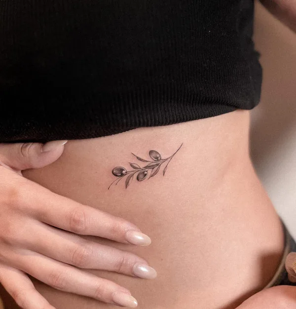 Minimalist Olive Branch Tattoo 1