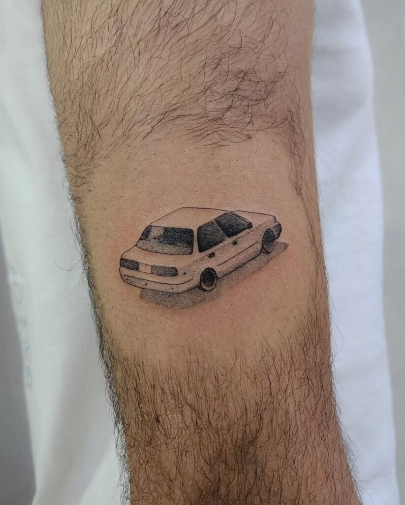 Minimalist and Realistic Classic Sedan Tattoo (Volkswagen Jetta Inspired) on Side Arm – Car Tattoo Ideas