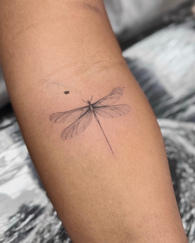 Minimalist Dragonfly Tattoo with Soft Shading Subtle and Meaningful Design