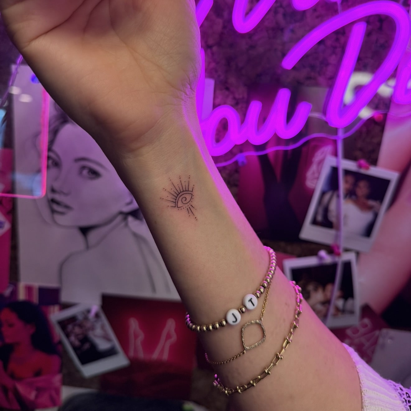 Minimalist Eye Tattoo with Radiating Lines Mystical & Symbolic Wrist Design