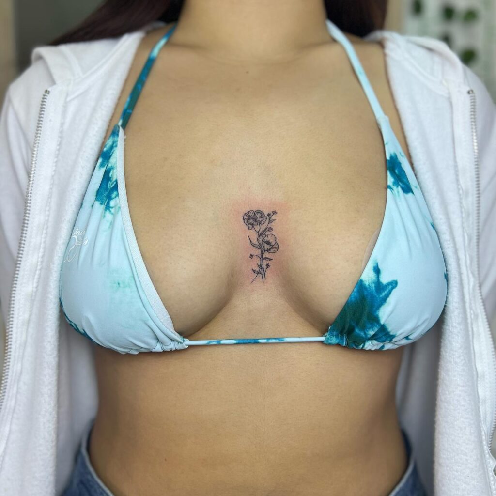Minimalist Floral Sternum Tattoo for Females: Feminine Delicacy