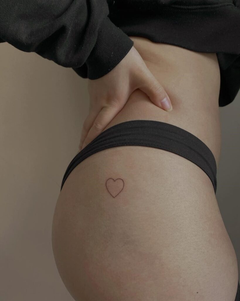 Minimalist Heart Buttock Tattoo for Girls: Subtle Cheek Elegance
