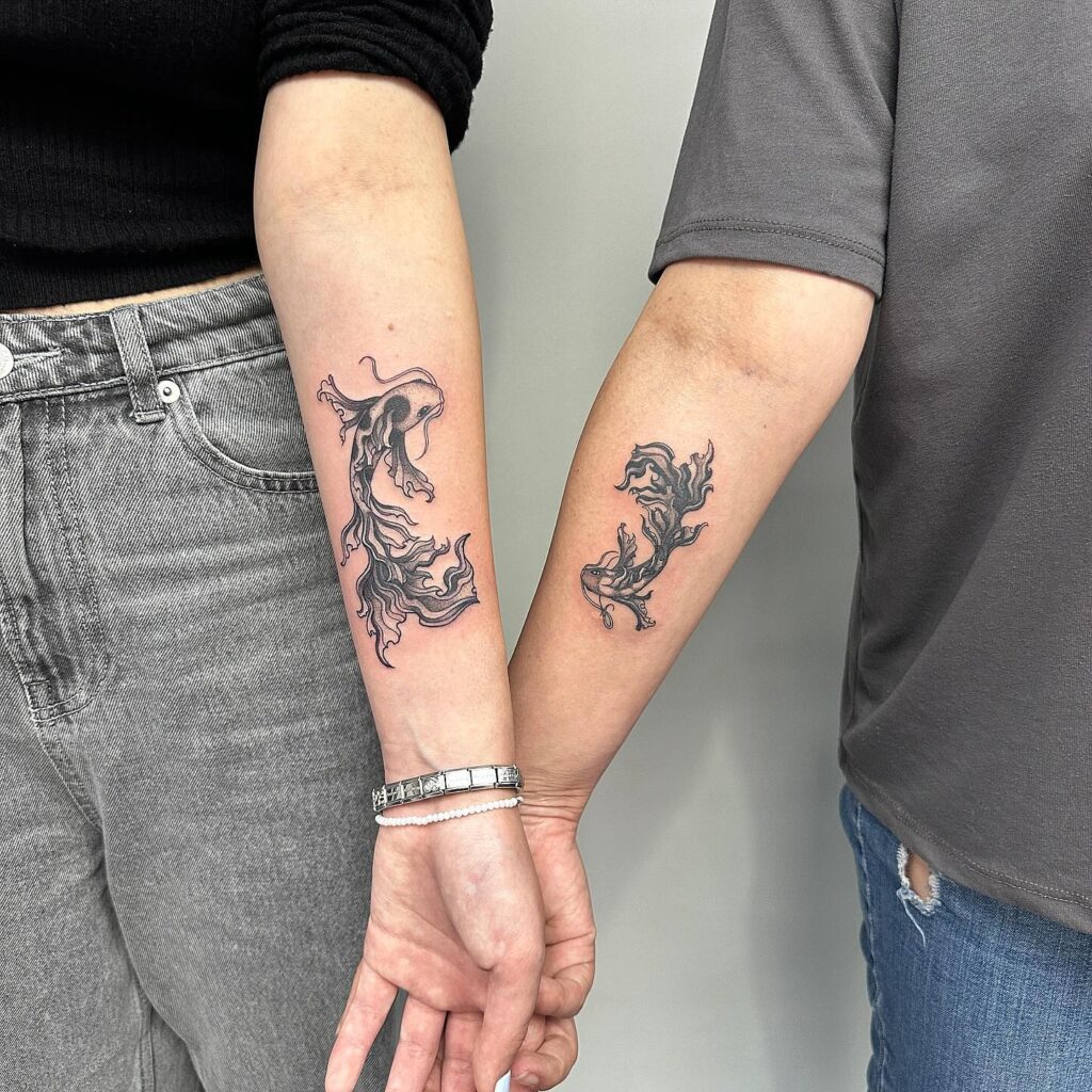 Minimalist koi fish tattoo representing balance and connection