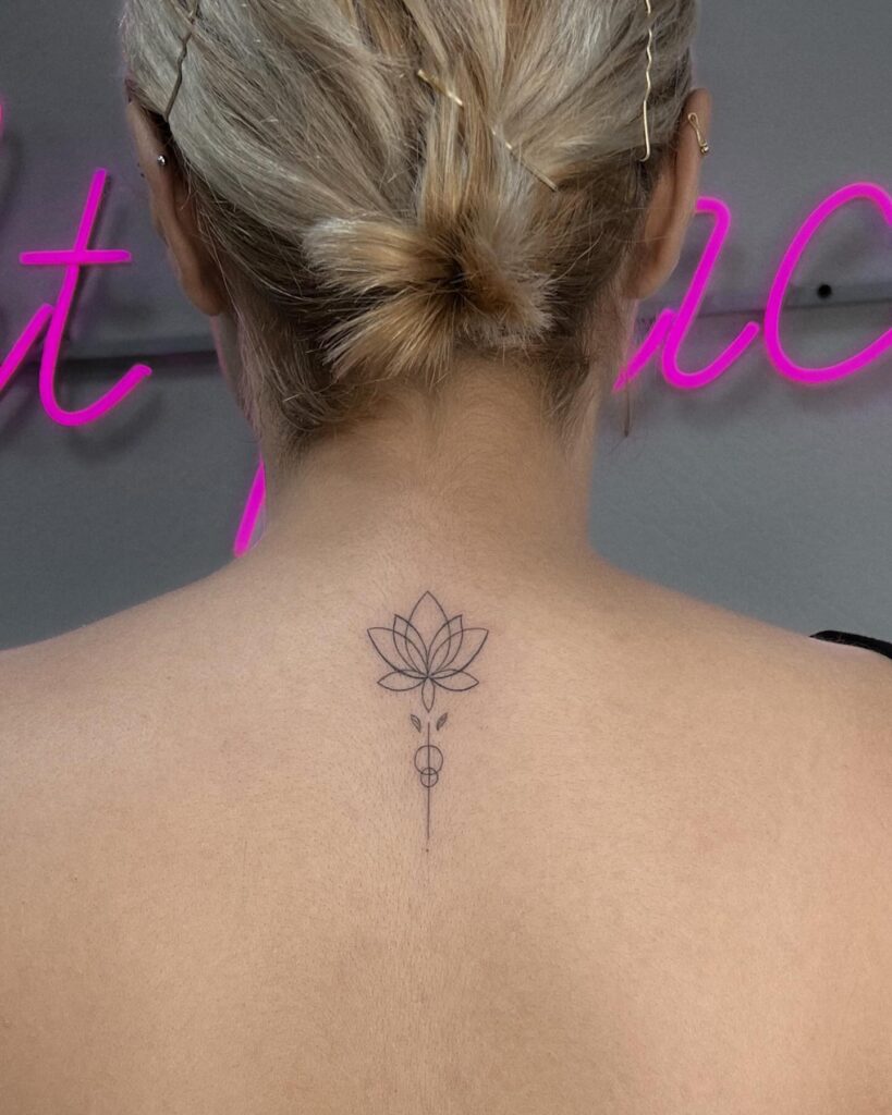 Minimalist Lotus Tattoo on the Back of the Neck: Geometric Bloom