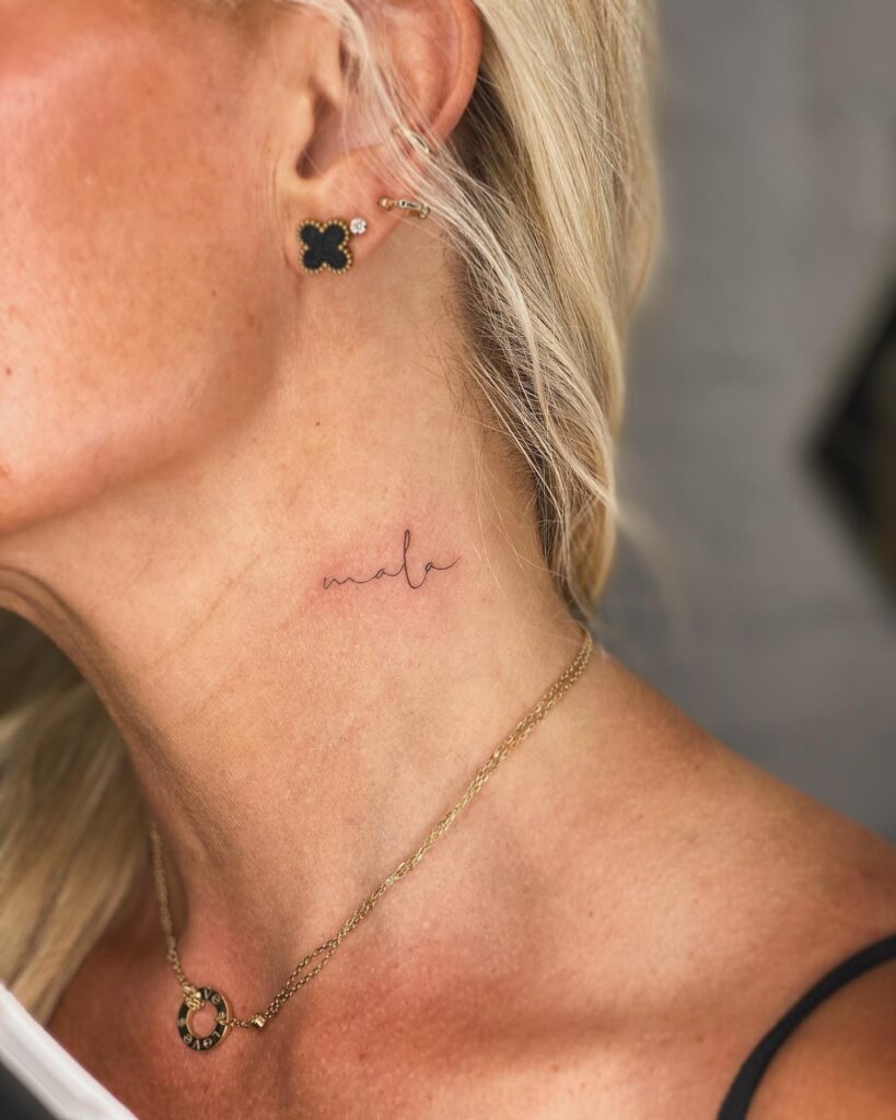 Minimalist Malo Script Neck Tattoo Elegant and Personal Fine-Line Design