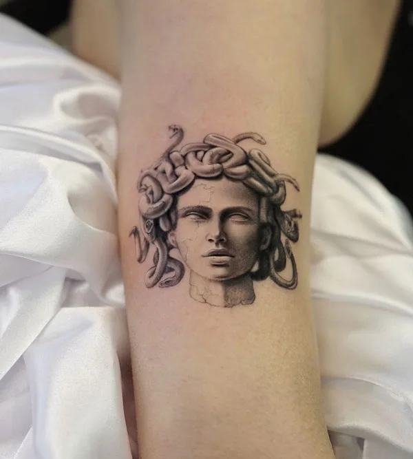 Minimalist medusa tattoo