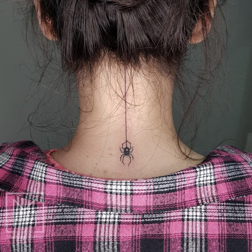Minimalist Spider Neck Tattoo Edgy and Symbolic of Creativity