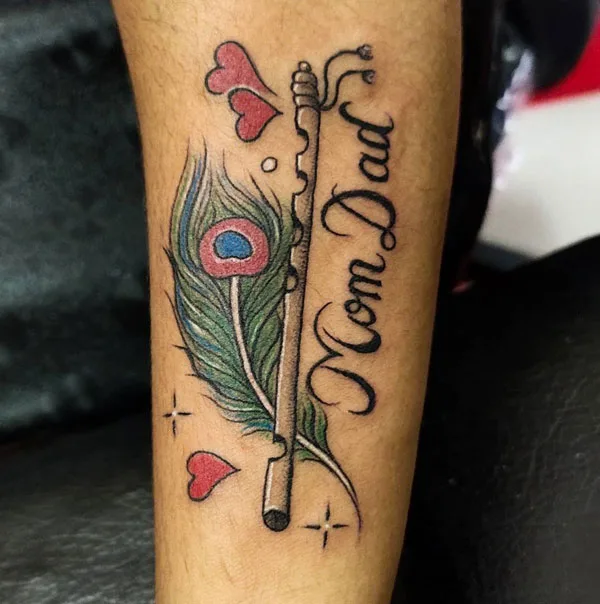 Mom and dad feather tattoo