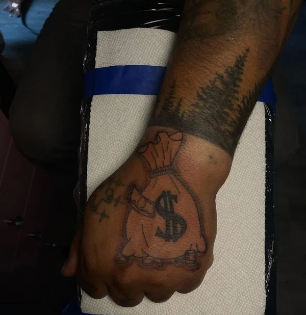 Money bag tattoo 38