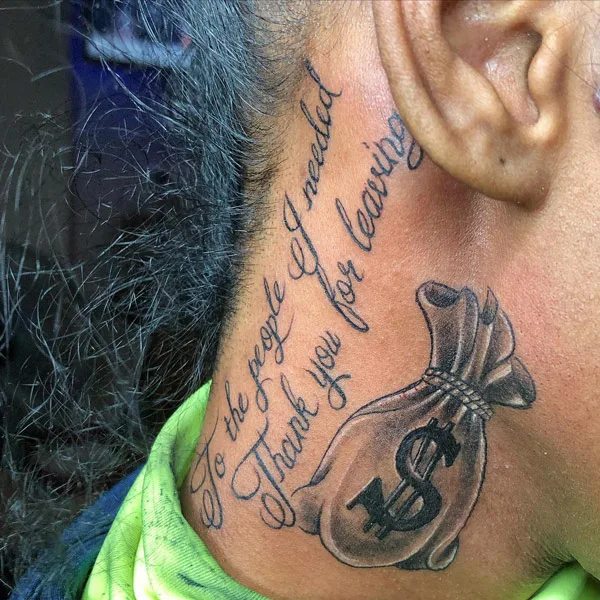 Money bag tattoo on neck