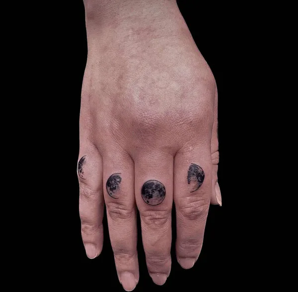 Moon Phase Finger Tattoo 1