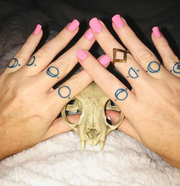 Moon Phase Finger Tattoo 2